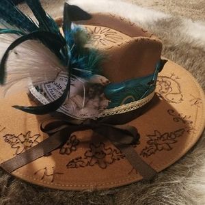 Western hand burned fadora tan in color